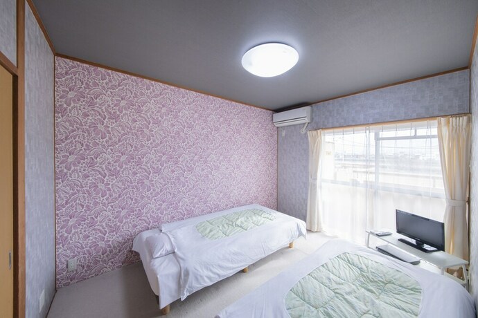 Imagen de la habitación del Hotel Sanuki mansion. Foto 22