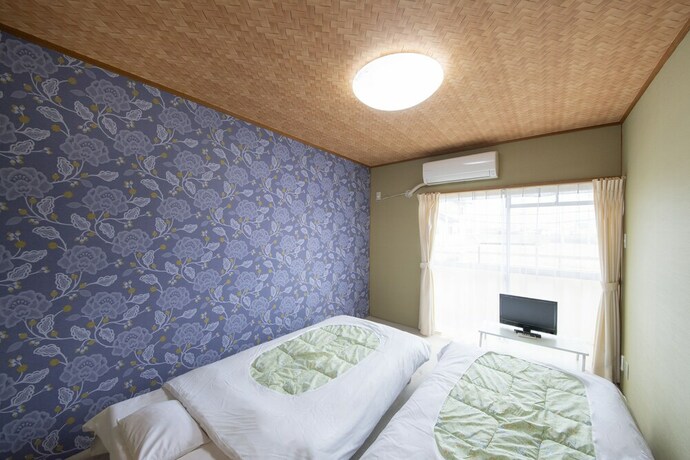 Imagen de la habitación del Hotel Sanuki mansion. Foto 24