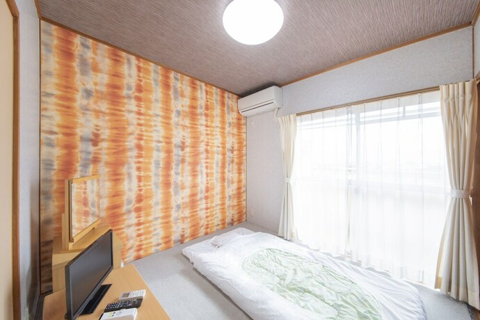 Imagen de la habitación del Hotel Sanuki mansion. Foto 25