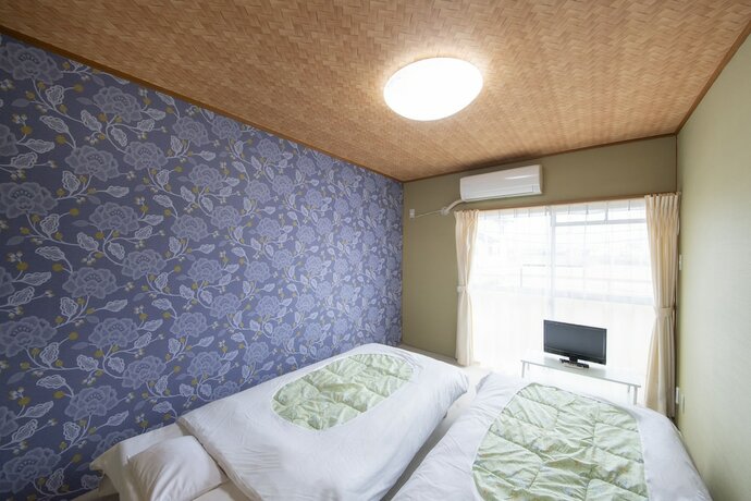 Imagen de la habitación del Hotel Sanuki mansion. Foto 26