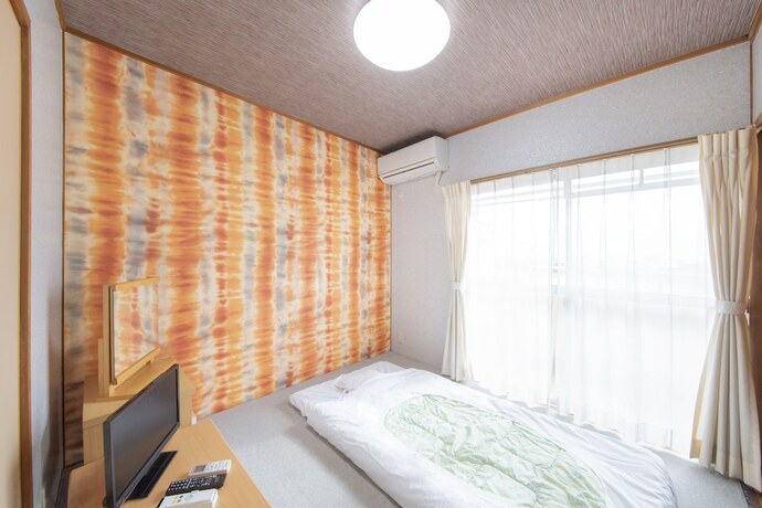 Imagen de la habitación del Hotel Sanuki mansion. Foto 28