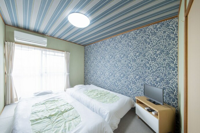 Imagen de la habitación del Hotel Sanuki mansion. Foto 32