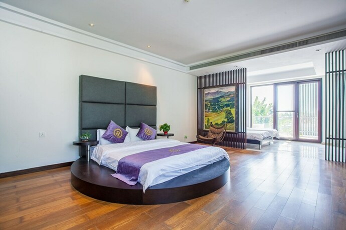 Imagen de la habitación del Hotel Sanya Chenxi Holiday Villa Apartment. Foto 12