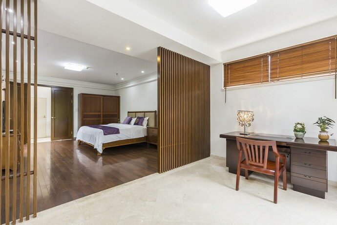 Imagen de la habitación del Hotel Sanya Chenxi Holiday Villa Apartment. Foto 14