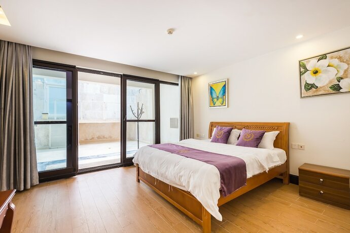 Imagen de la habitación del Hotel Sanya Chenxi Holiday Villa Apartment. Foto 17