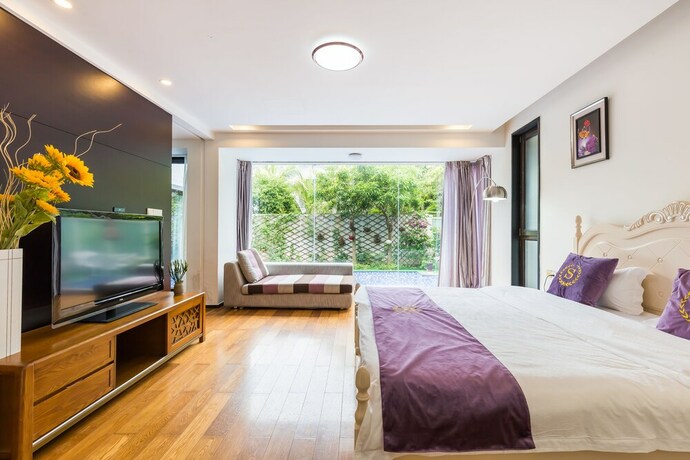 Imagen de la habitación del Hotel Sanya Chenxi Holiday Villa Apartment. Foto 25