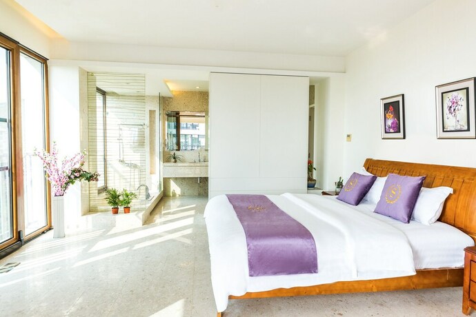 Imagen de la habitación del Hotel Sanya Chenxi Holiday Villa Apartment. Foto 27