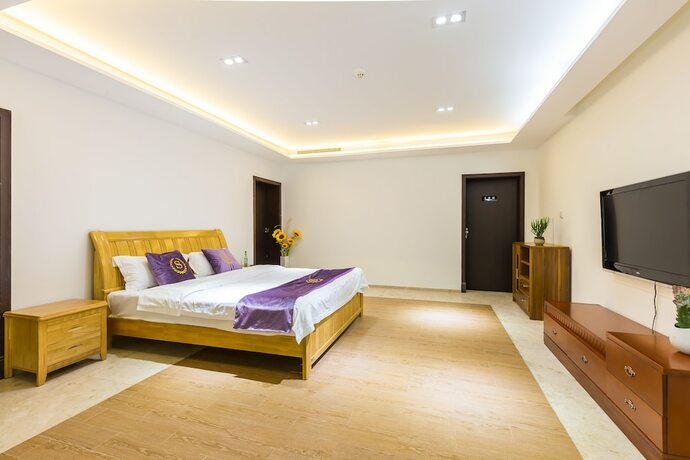 Imagen de la habitación del Hotel Sanya Chenxi Holiday Villa Apartment. Foto 31