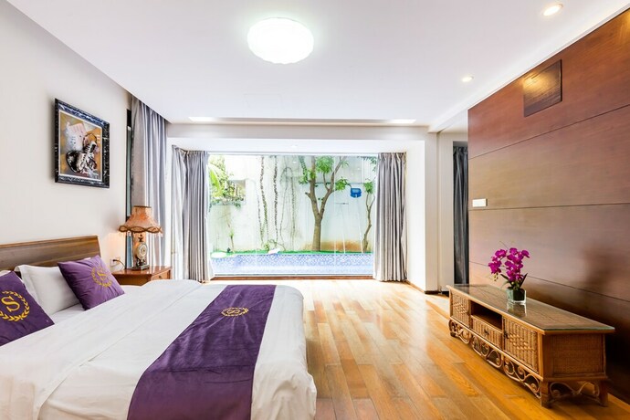 Imagen de la habitación del Hotel Sanya Chenxi Holiday Villa Apartment. Foto 33