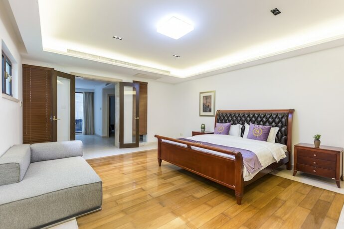 Imagen de la habitación del Hotel Sanya Chenxi Holiday Villa Apartment. Foto 35