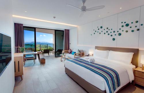Imagen de la habitación del Hotel Sanya Conifer Resort. Foto 3