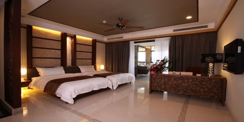 Imagen de la habitación del Hotel Sanya Haohanpo Gloria Hotspring Resort. Foto 27