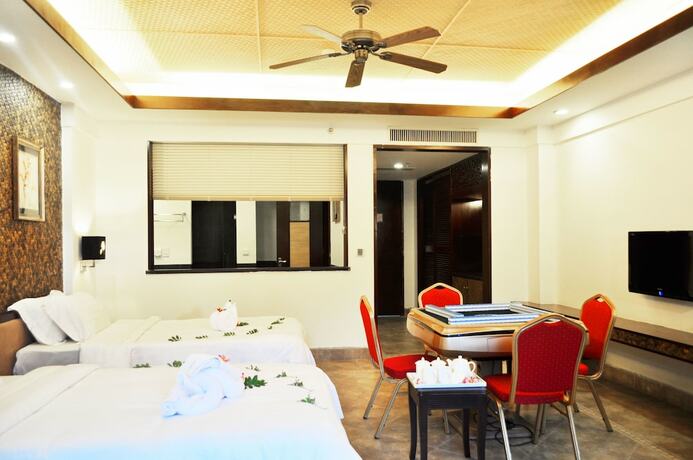 Imagen de la habitación del Hotel Sanya Haohanpo Gloria Hotspring Resort. Foto 32