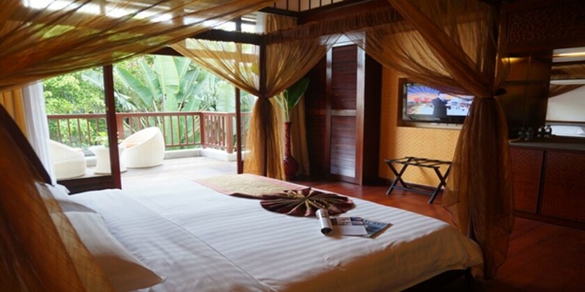 Imagen de la habitación del Hotel Sanya Haohanpo Gloria Hotspring Resort. Foto 34