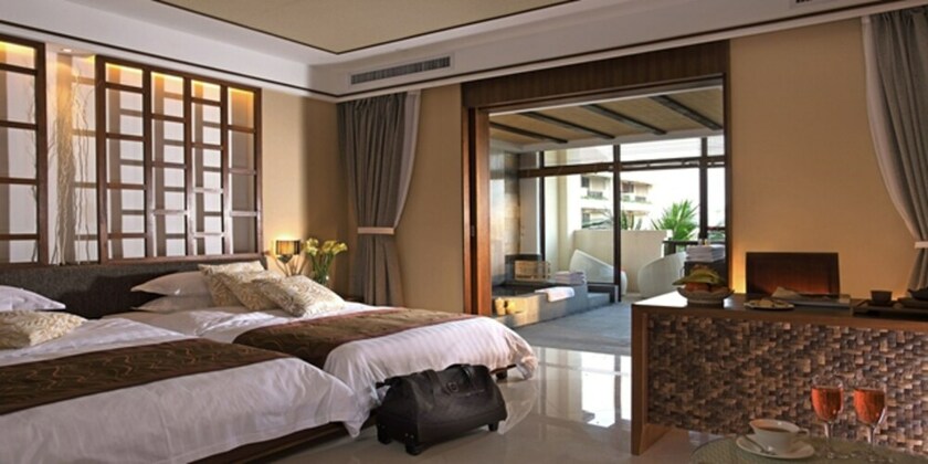 Imagen de la habitación del Hotel Sanya Haohanpo Gloria Hotspring Resort. Foto 35
