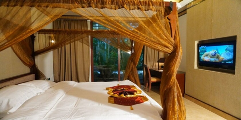 Imagen de la habitación del Hotel Sanya Haohanpo Gloria Hotspring Resort. Foto 36