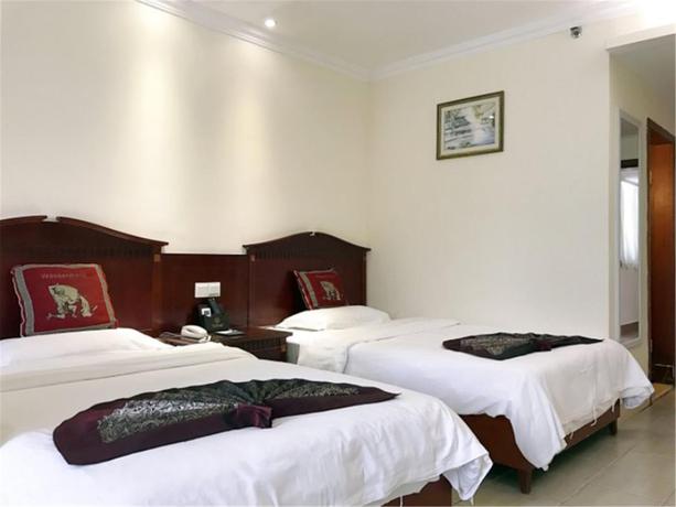 Imagen de la habitación del Hotel Sanya Harvest Qilin. Foto 4