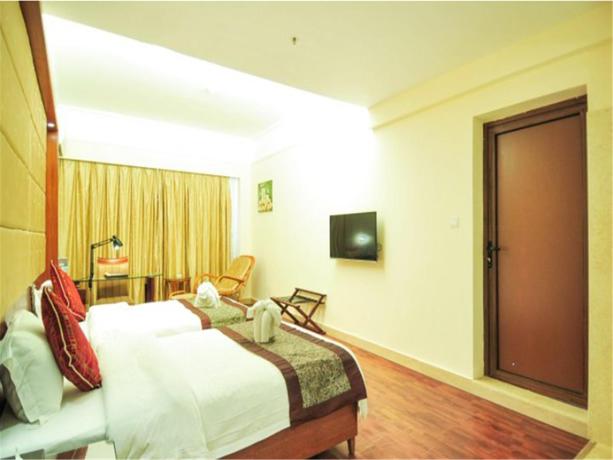 Imagen de la habitación del Hotel Sanya Harvest Qilin. Foto 6