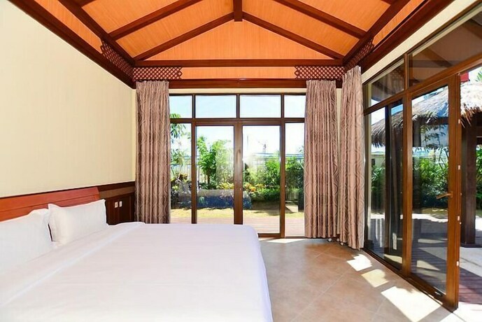 Imagen de la habitación del Hotel Sanya Jiahua Shunze Resort Apartment. Foto 12