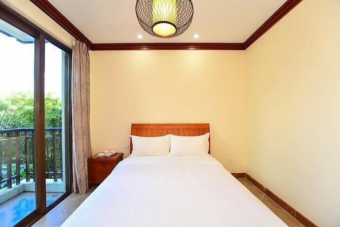 Imagen de la habitación del Hotel Sanya Jiahua Shunze Resort Apartment. Foto 14