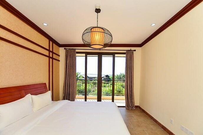 Imagen de la habitación del Hotel Sanya Jiahua Shunze Resort Apartment. Foto 15