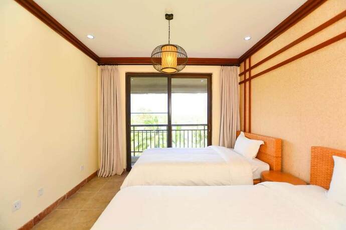 Imagen de la habitación del Hotel Sanya Jiahua Shunze Resort Apartment. Foto 21