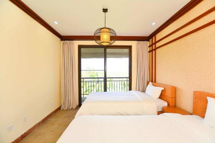Imagen de la habitación del Hotel Sanya Jiahua Shunze Resort Apartment. Foto 26