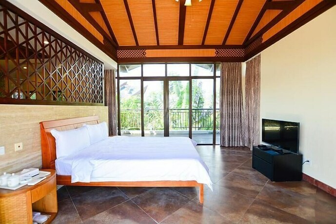 Imagen de la habitación del Hotel Sanya Jiahua Shunze Resort Apartment. Foto 39