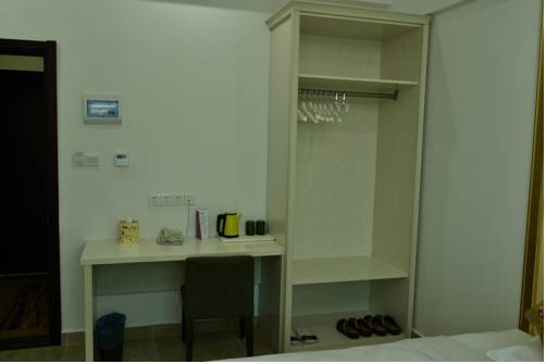 Imagen de la habitación del Hotel Sanya Meidu. Foto 4