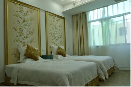 Imagen de la habitación del Hotel Sanya Meidu. Foto 5