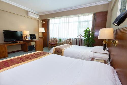 Imagen de la habitación del Hotel Sanya Oriental Seaview. Foto 4