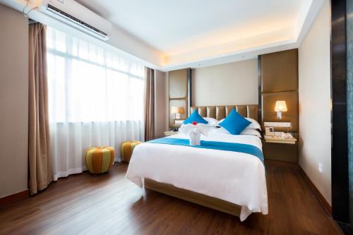 Imagen de la habitación del Hotel Sanya Oriental Seaview. Foto 6