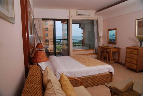 Imagen de la habitación del Hotel Sanya Palmena International Apartment. Foto 7