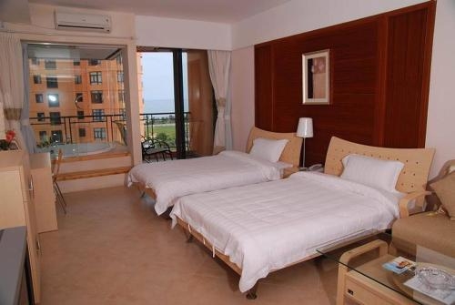 Imagen de la habitación del Hotel Sanya Palmena International Apartment. Foto 8