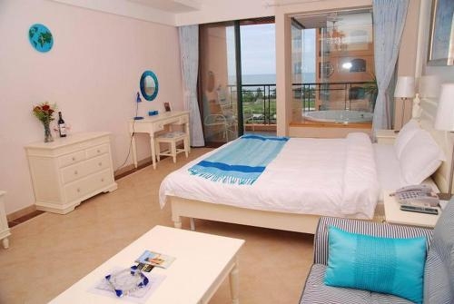 Imagen de la habitación del Hotel Sanya Palmena International Apartment. Foto 9