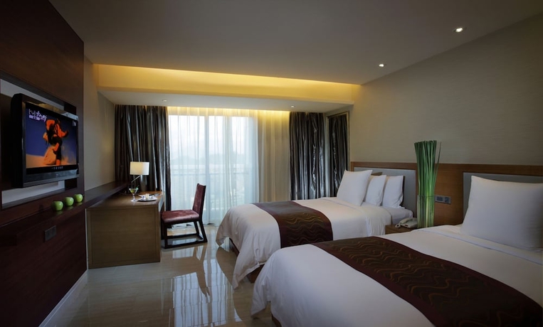 Imagen de la habitación del Hotel Sanya Phoenix Waterside Gloria Resort. Foto 15