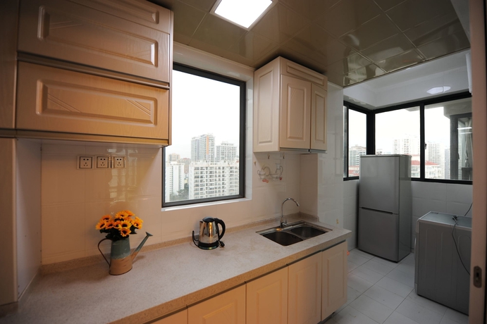 Imagen de la habitación del Hotel Sanya Qingjinghaiwan Apartment. Foto 2