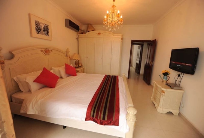 Imagen de la habitación del Hotel Sanya Qingjinghaiwan Apartment. Foto 3