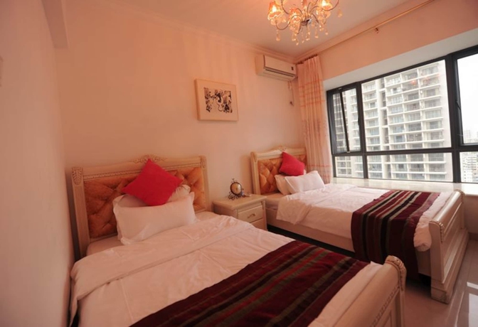 Imagen de la habitación del Hotel Sanya Qingjinghaiwan Apartment. Foto 4