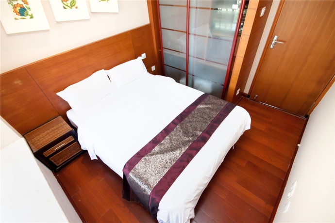 Imagen de la habitación del Hotel Sanya Qingjinghaiwan Apartment. Foto 6