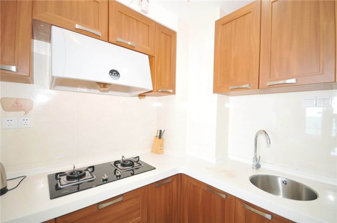 Imagen de la habitación del Hotel Sanya Qingjinghaiwan Apartment. Foto 12