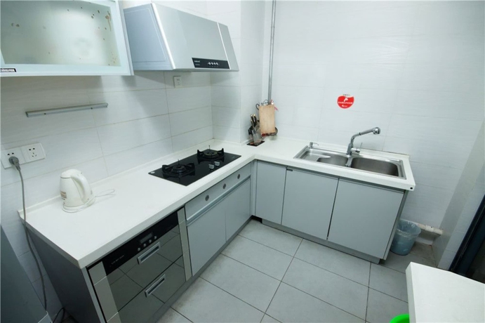 Imagen de la habitación del Hotel Sanya Qingjinghaiwan Apartment. Foto 14