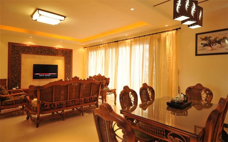 Imagen de la habitación del Hotel Sanya Qingjinghaiwan Apartment. Foto 15