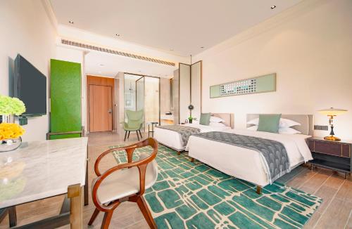 Imagen de la habitación del Hotel Sanya Rock Platinum Sea View. Foto 9