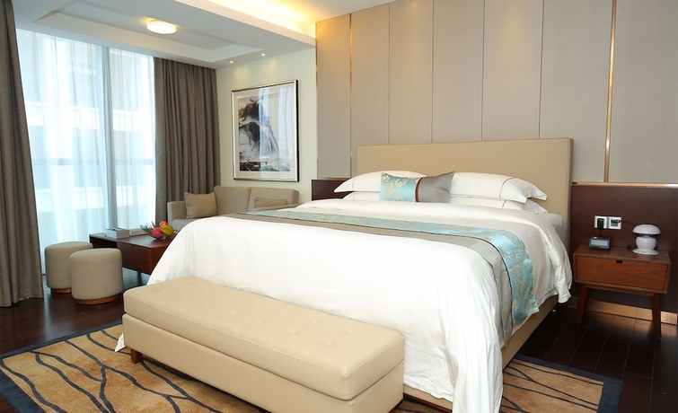 Imagen de la habitación del Hotel Sanya Shuang Da International. Foto 5