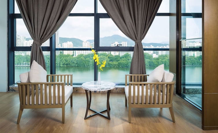 Imagen de la habitación del Hotel Sanya Shuang Da International. Foto 8