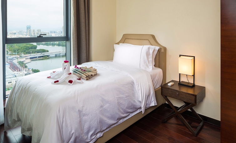 Imagen de la habitación del Hotel Sanya Shuang Da International. Foto 10