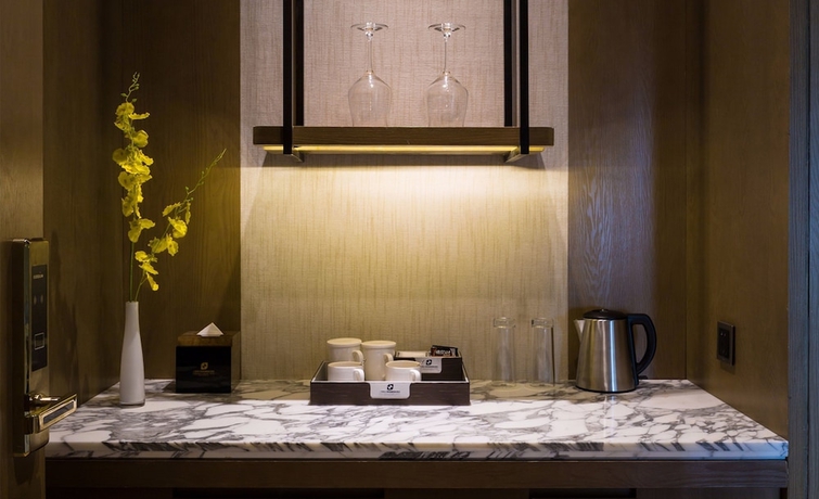 Imagen de la habitación del Hotel Sanya Shuang Da International. Foto 12