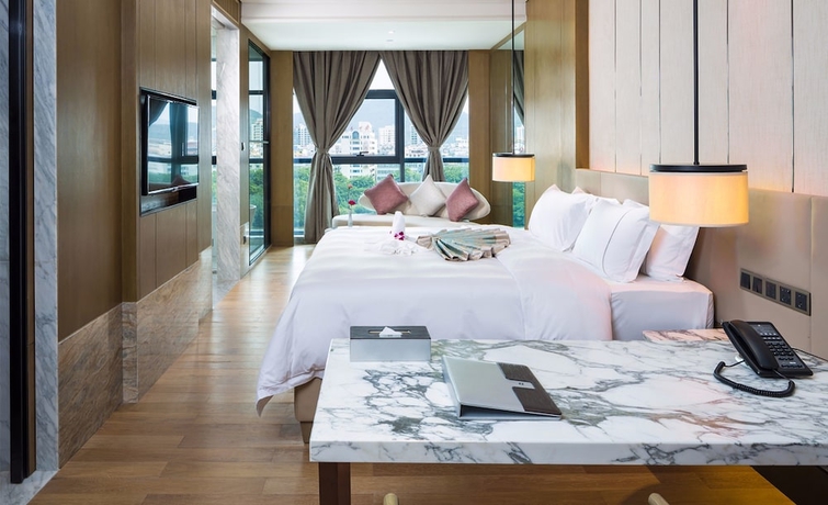 Imagen de la habitación del Hotel Sanya Shuang Da International. Foto 14