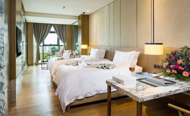 Imagen de la habitación del Hotel Sanya Shuang Da International. Foto 17
